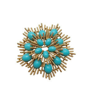 Susan Caplan for Avon 1972 Starburst Faux Turquoise Cabochon Gold Tone Brooch